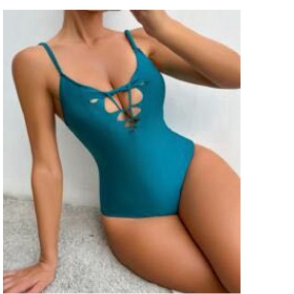 NEW teal one piece with cut outs and braided straps